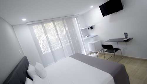 Habitación triple superior, balcón