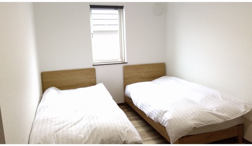 Habitación con 2 camas individuales