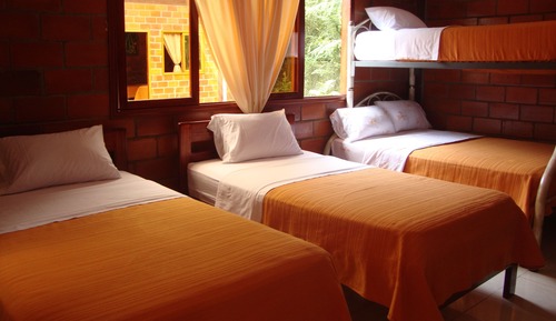 Habitación triple, vistas al jardín