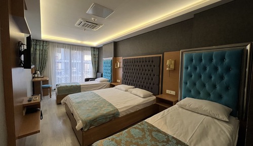 Habitación cuádruple Deluxe