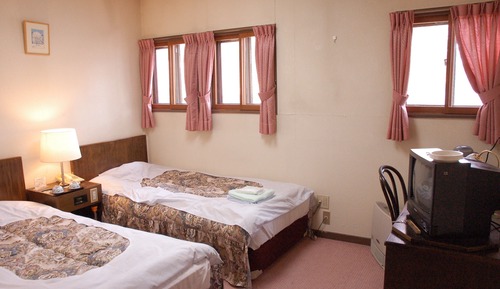 Habitación con 2 camas individuales