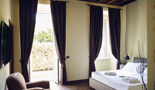 Suite superior, baño privado (Suite Sordi)