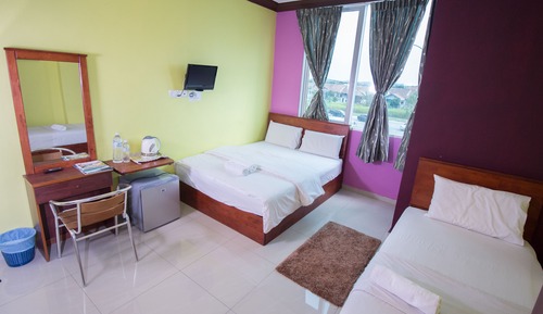 Suite superior, varias camas