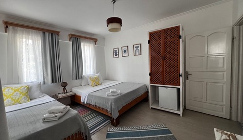 Habitación triple Deluxe, varias camas