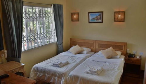 Habitación con 2 camas individuales