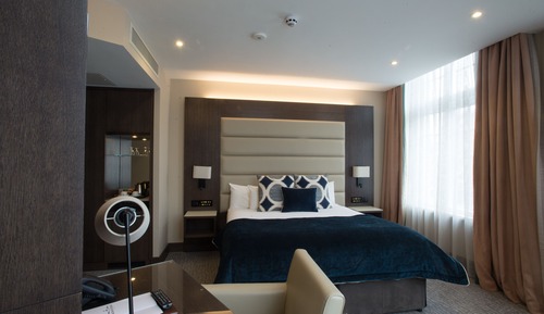 Habitación junior con 1 cama doble o 2 individuales