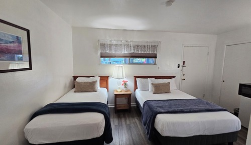 Habitación, varias camas
