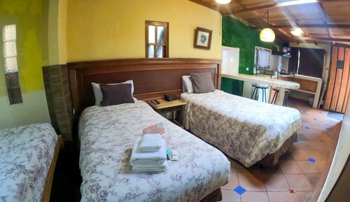 Habitación triple, cocina