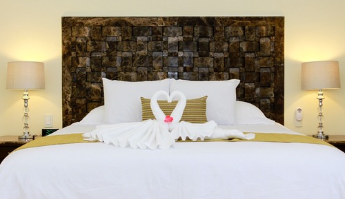 Suite Deluxe, 1 cama de matrimonio grande con sofá cama, vistas parciales al mar