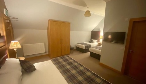 Habitación cuádruple Deluxe