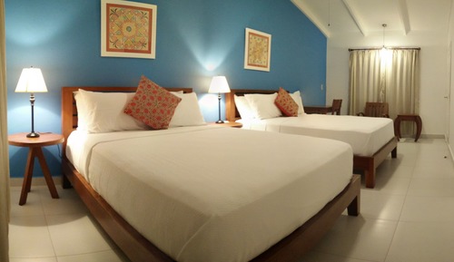 Habitación cuádruple familiar, 2 camas de matrimonio, vistas al patio