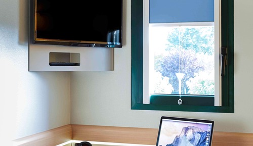 Habitación triple, varias camas