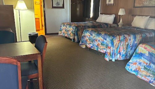 Habitación, varias camas