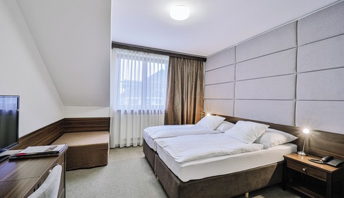 Habitación Confort con 1 cama doble o 2 individuales