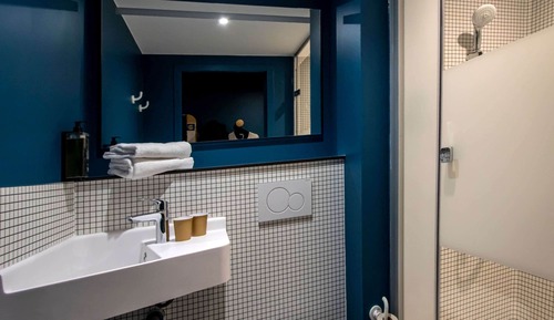 Habitación triple, varias camas