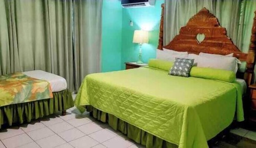 Habitación económica, varias camas, vistas al jardín