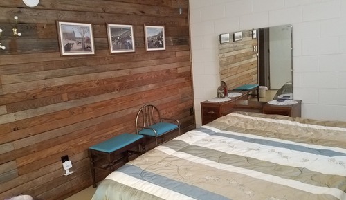 Habitación ejecutiva, 1 cama de matrimonio grande, baño compartido, en la zona del jardín