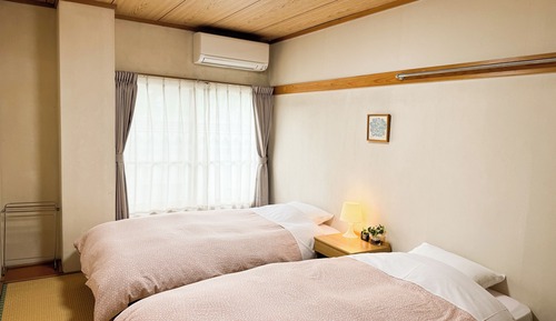Habitación con 2 camas individuales