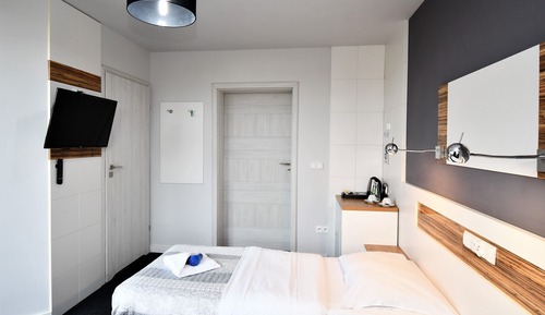 Habitación clásica con 1 cama doble o 2 individuales, baño privado