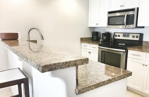 Grace Bay West Condominio | Oasis | 1 BR Condo | Tropical View | Wifi & Pool