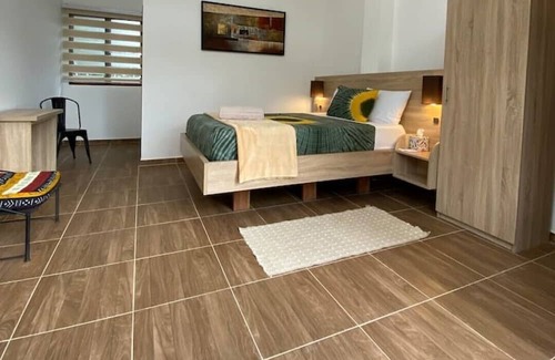 Aburi Apartamento | The Treehouse Studio apartments with a large rooftop terrace.