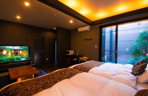 Oita Casa | Twin bed Tatami Onsen outdoor rock bath / Oita Ōita