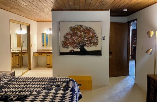 Lake Cavanaugh Cabina | Charming Waterfront Mid Century Waterfront Cabin w/ Hot Tub + Breathtaking Views