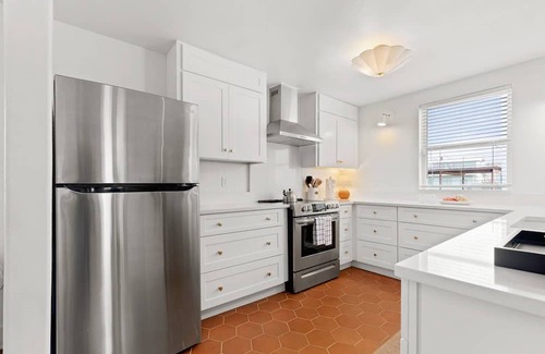 Arsenal Casa | Professionally Designed, Near Riverwalk, Two Bedroom Suites, Off Street Parking, Patio, Fast WiFi