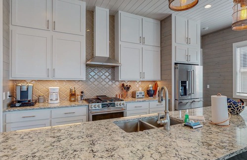 Port Aransas Casa | KD671 Luxurious Home with Private Heated Pool and Oasis, Partial Gulf Views and Golf Cart Included!