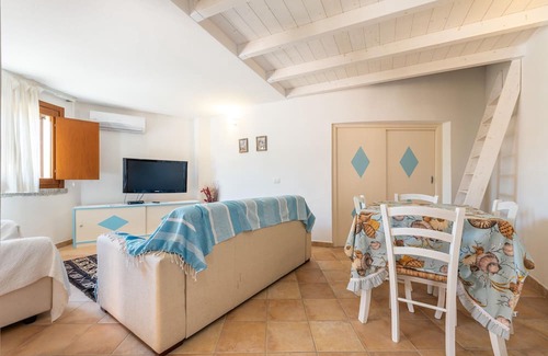 Costa Rei Casa | Holiday Home 'Villetta Riccardo N7' with Mountain View, Shared Pool and Air Conditioning