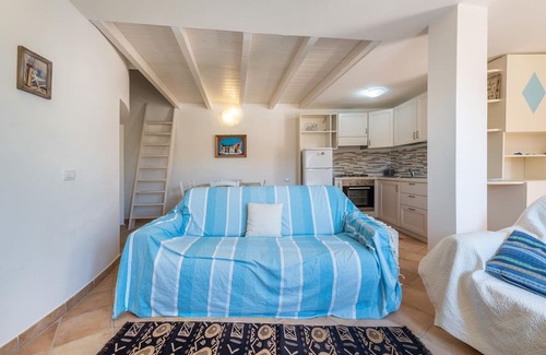 Costa Rei Casa | Holiday Home 'Villetta Riccardo N7' with Mountain View, Shared Pool and Air Conditioning