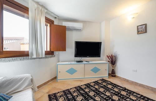 Costa Rei Casa | Holiday Home 'Villetta Riccardo N7' with Mountain View, Shared Pool and Air Conditioning
