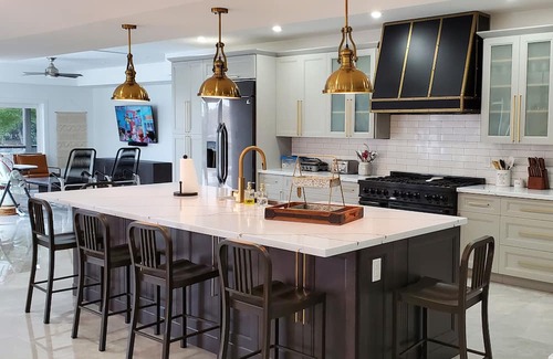 Caloosahatchee Casa | Custom Home with tile pool, boating dock and every comfort