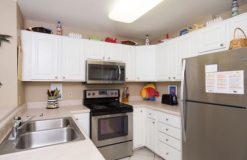 Fort Morgan Condominio | Fácil de libro condominio con todo lo necesario para unas vacaciones en la playa!