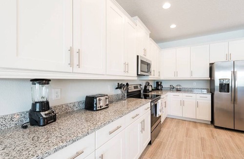 Reunion Casa | Modern Home with Upscale Living at Reunion