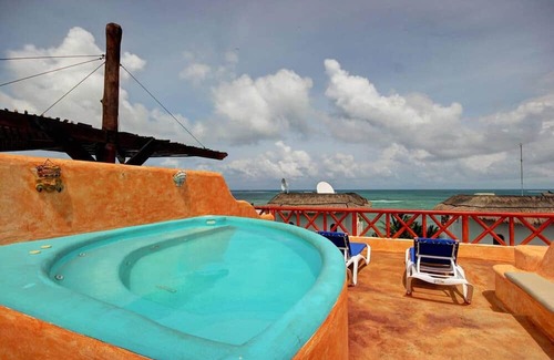 Puerto Morelos Condominio | Luxury, Oceanfront condo with four master suites for family or groups
