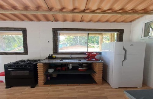 Praia da Fortaleza Condominio | Next to lush nature, suite with TV, kitchen, wifi, barbecue, and garage