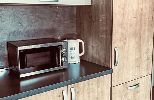 Steinberg am Rofan Apartamento | Lovely apartment for 4 guests with WIFI, patio, pets allowed and parking
