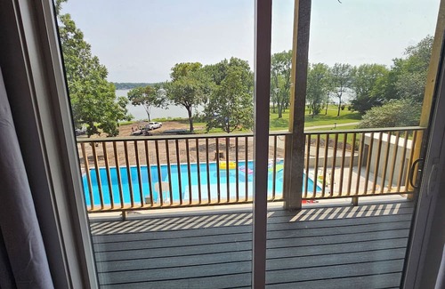 Grove Casa | Giant10-bedroom lakefront home with large pool, hot tub, and dock