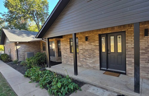 Grove Casa | Giant10-bedroom lakefront home with large pool, hot tub, and dock