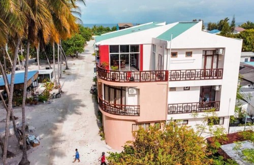 Huraa Casa | Seaview Suite in Huraa Guesthouse with AC, Wifi & Balcony