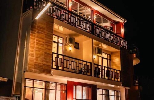 Huraa Casa | Seaview Suite in Huraa Guesthouse with AC, Wifi & Balcony