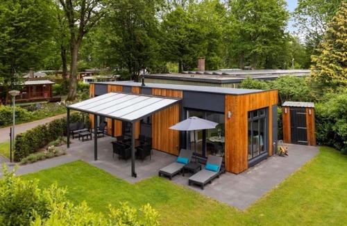 De Hooilanden Casa | The Veluwe Chalet offers a luxurious and comfortable vacation experience on a spacious plot with a private garden and excellent amenities.