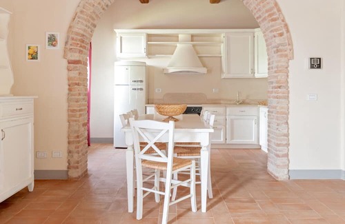 Toiano Casa | Holiday Home 'Casa Rossa - Campagna Toscana' with Shared Pool, Private Garden and Wi-Fi