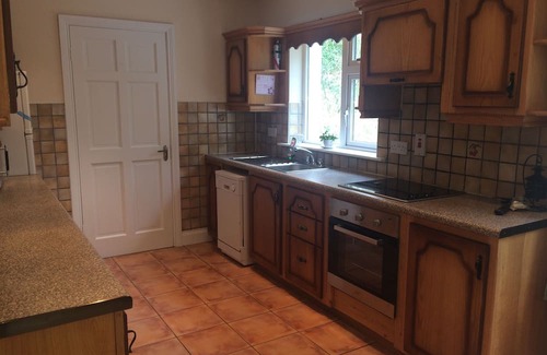 Kenmare Condominio | 3 bedroom home to sleep 7 with stunning views of the Sheen River and Falls