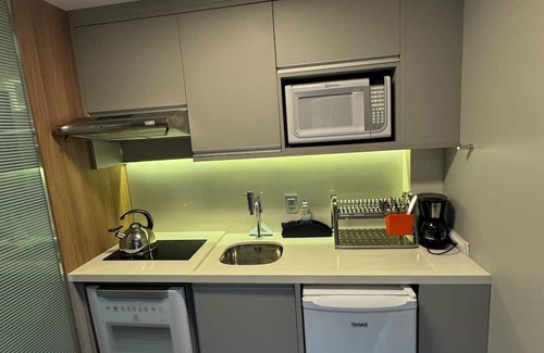 Agua Verde Apartamento | Complete studio in Batel, Wi-Fi, kitchen and dining/work table