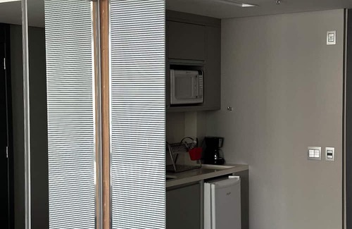 Agua Verde Apartamento | Complete studio in Batel, Wi-Fi, kitchen and dining/work table