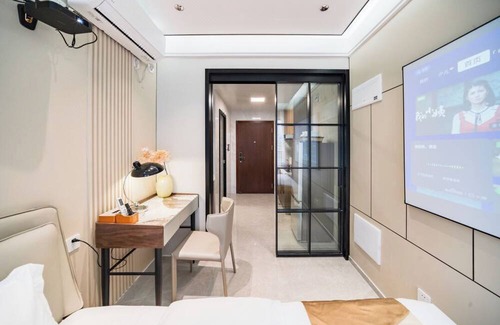 Central Business District Apartamento | Shenzhen Bosten Apartment GangxiagSubway