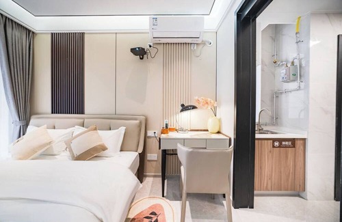Central Business District Apartamento | Shenzhen Bosten Apartment GangxiagSubway