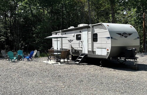 Gardiner Casa | small campground in the woods with a very unique bath house